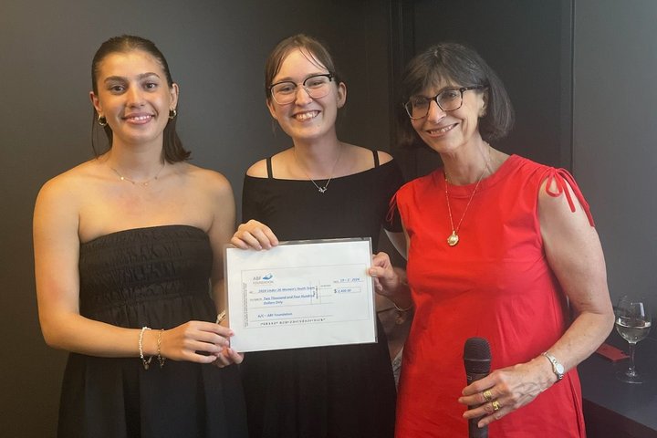 The Under 26 Women’s team receiving the Foundation’s cheque
