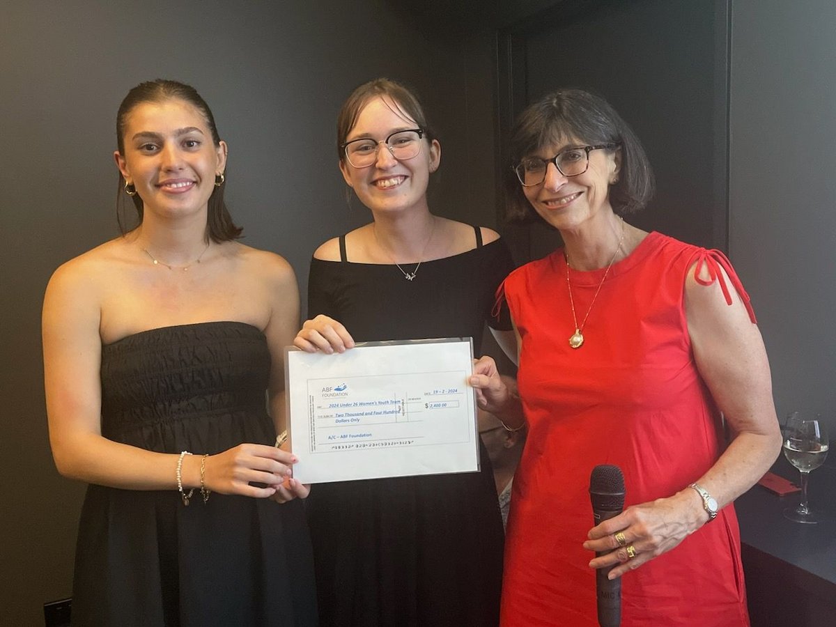 The Under 26 Women’s team receiving the Foundation’s cheque